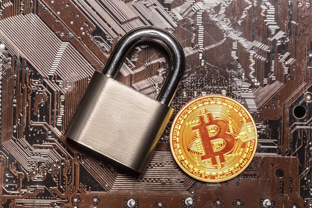 https://cmrindia.com/wp-content/uploads/2026/07/gold-bitcoin-padlock.jpg